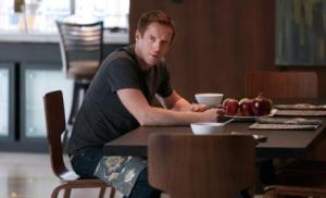 Brody sits pensively